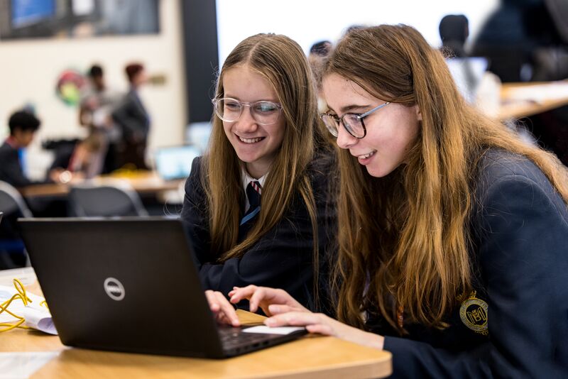 Two students work together on a laptop during an Ada Lovelace Day activity