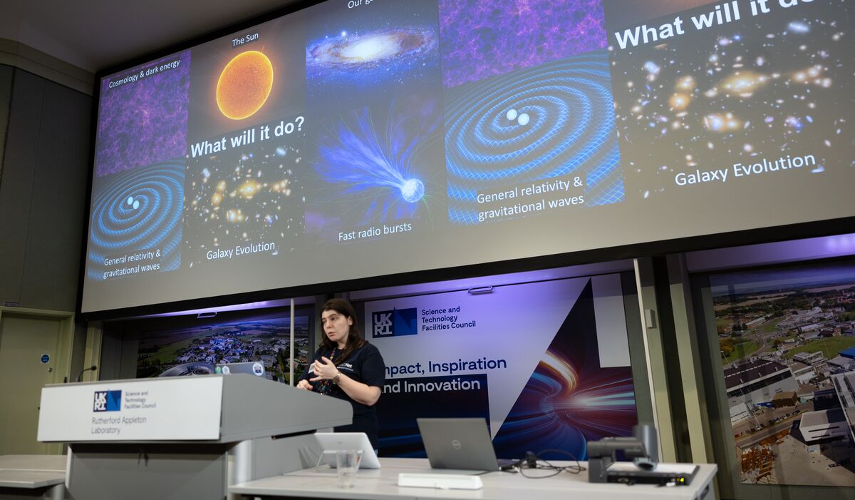 Person giving lecture on space