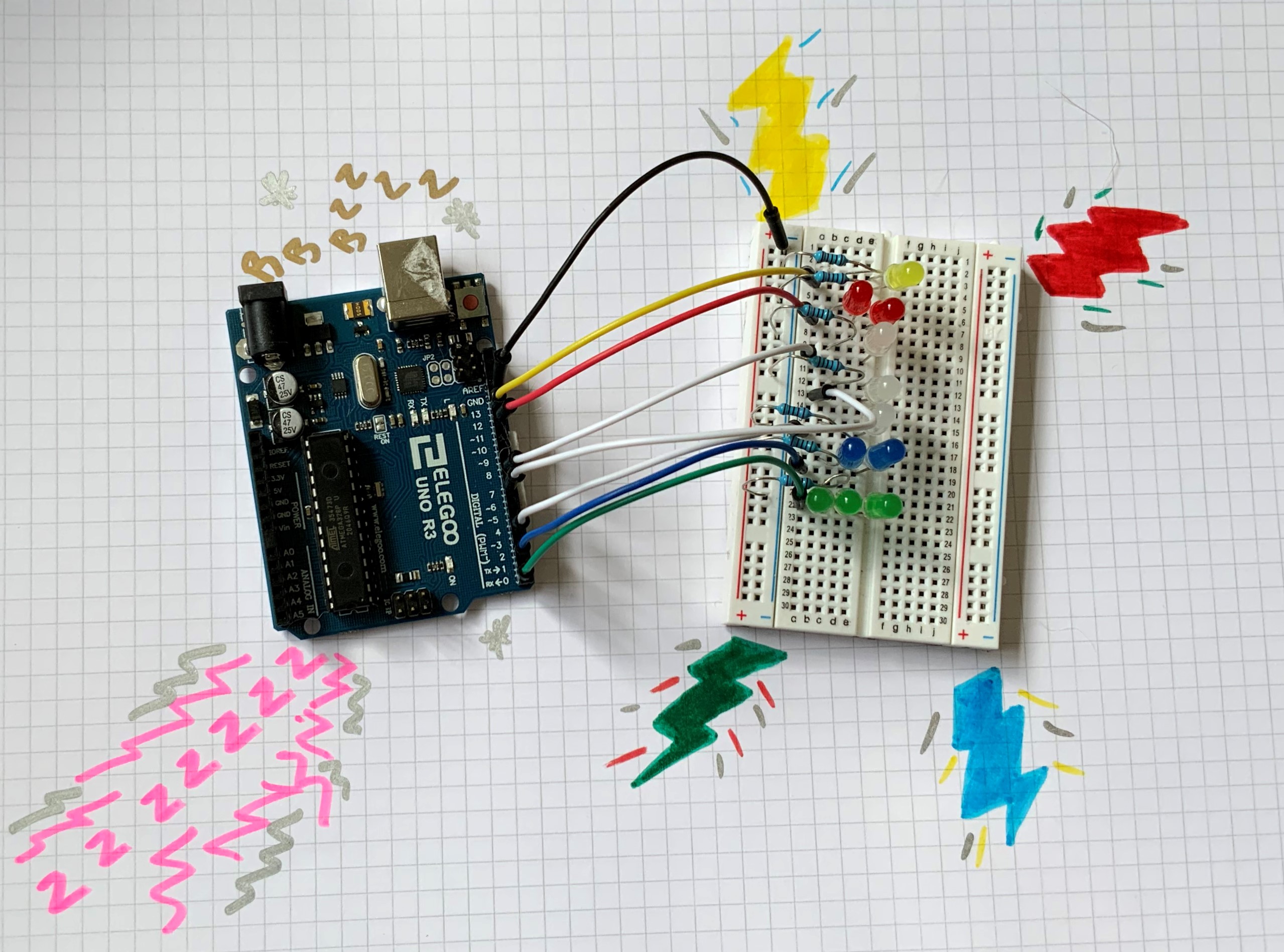 Arduino with wires to board with LED lights