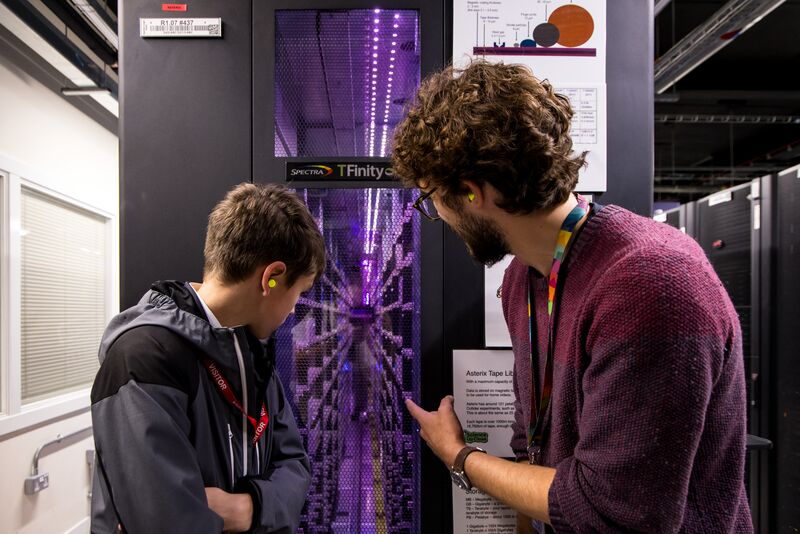 Staff member and student on tour of Scientific Computing Data Centre