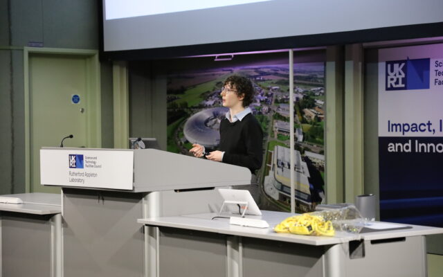 Staff member giving a talk in the lecture theatre